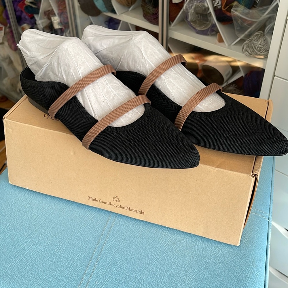 Elegant Black Flats with Brown Straps